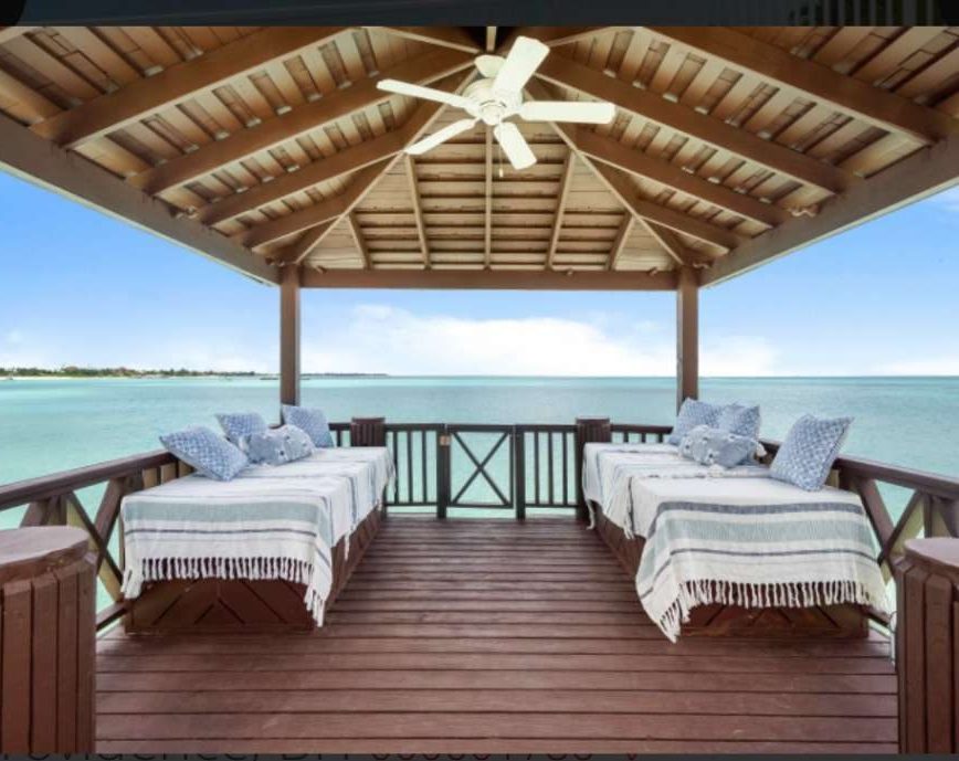 shack with sofa and beds